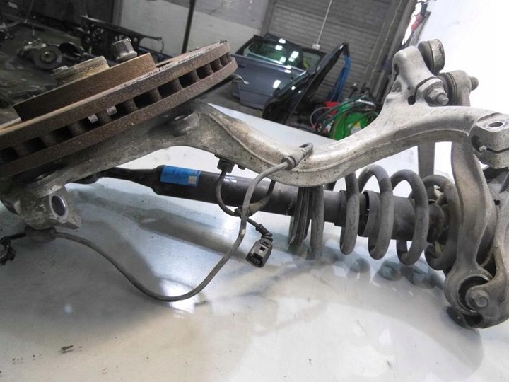 фото №3, Mcperson амортизатор поворотный кулак левый перед a4 b7