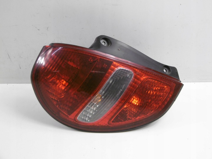 фото №10, Daihatsu sirion i m100 02-05 лампа зад левая koito 220-51673 + вкладка