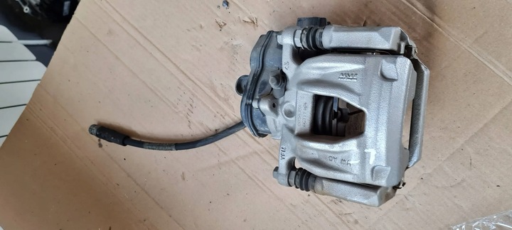 фото №1, Q5 80a суппорт тормозной левый зад 80a615405a