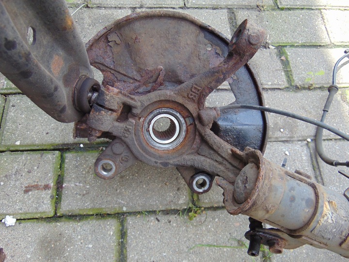 фото №9, Поворотный кулак mcperson левый левая перед mazda 2 de dh demio iii2007r- 1.3b eu