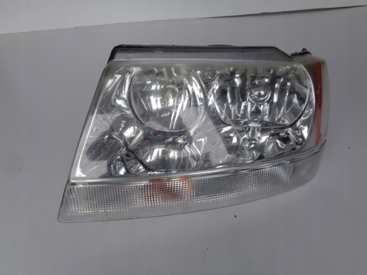 light left REFLEKTOR JEEP CHEROKEE 99-04