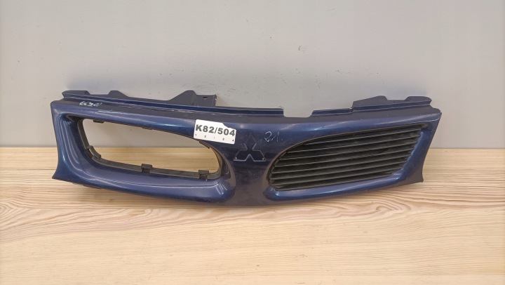 MITSUBISHI CARISMA 95-99 ROK maska MB944763 K82/504
