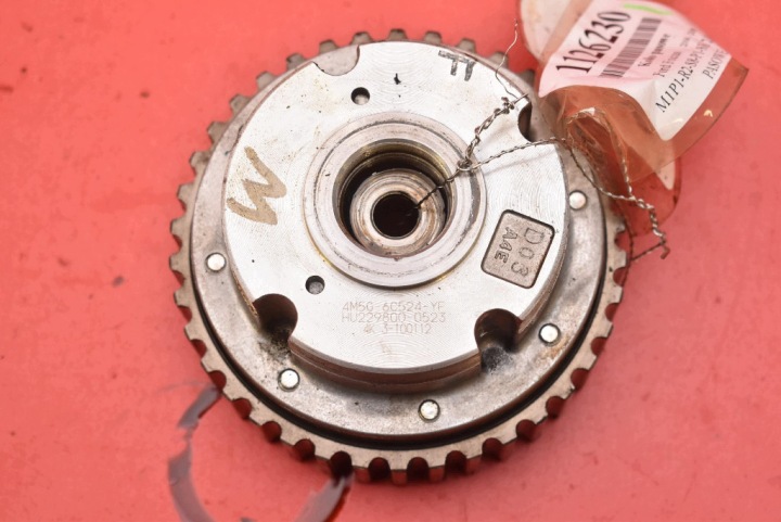 Galet tendeur courroie ZMIENNYCH FAZ de la distribution 4M5G-6C524-YF FORD FOCUS MK2 1.6 16V 116 KM 04