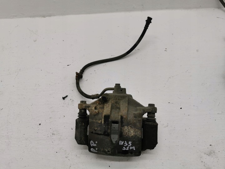 třmen brzdový pravý předek HYUNDAI IX35 10-15