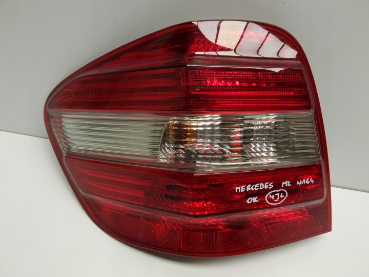 05-08r Mercedes ML W164 Jasna Licht heck links wklad Original oprawka