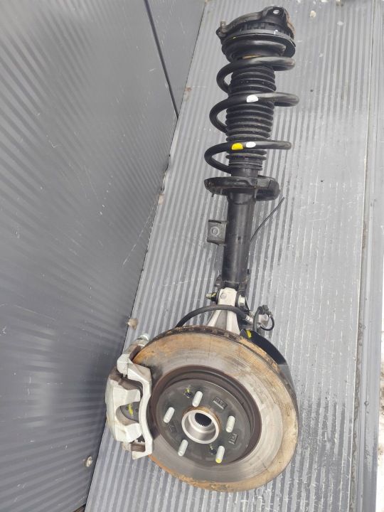 KIA SPORTAGE V glavčina amortizer prednji dio lijevi