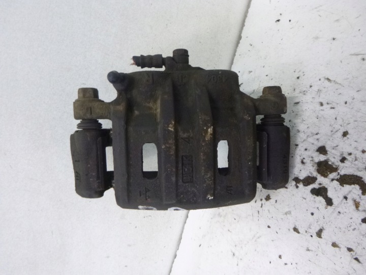 caliper brake + Jarzmo front right Mitsubishi Outlander and 2.4b 2004r.