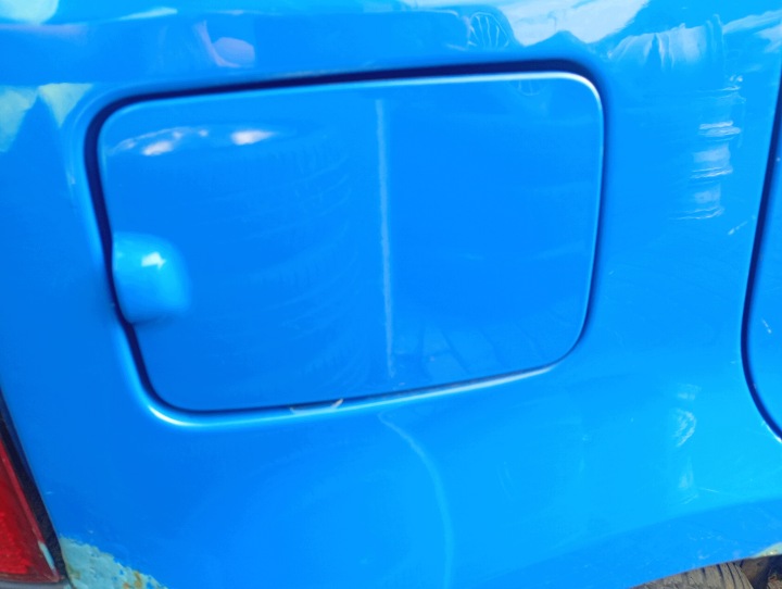 Tankklappe des Kraftstoffsbehälters Fiat Panda 2 II 03-09 kod lakieru 734/A