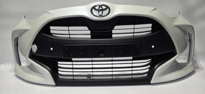 Pare chocs avant Grille/masque TOYOTA YARIS IV 20- PDC Original 52119-0DA00