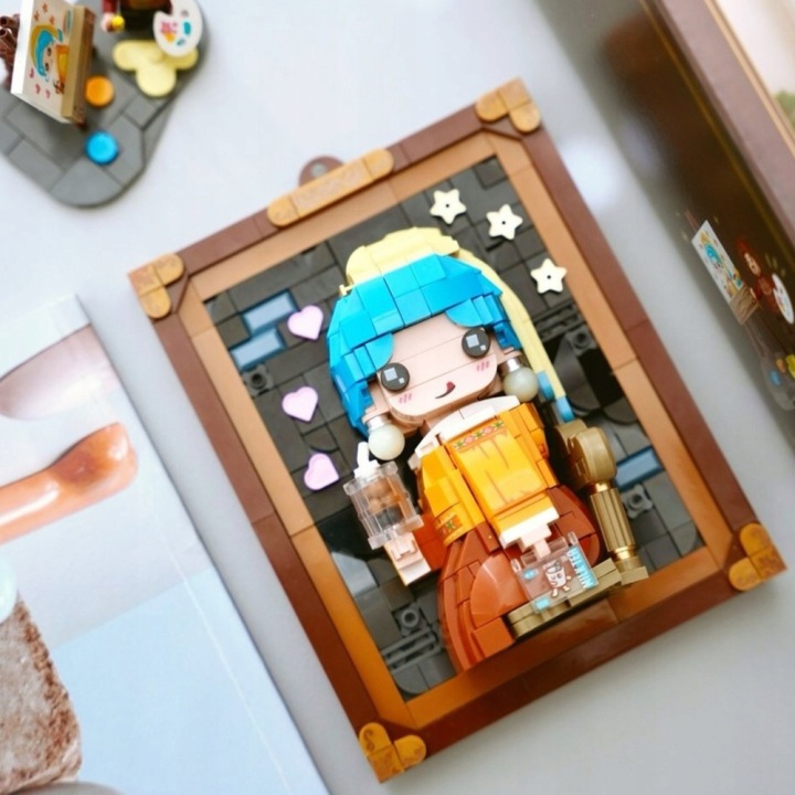Конструктор 676 ел. 3D картина - дівчинка з перламутровими сережками — фото 8