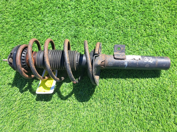 FORD TOURNEO 2T14-18K001-AH shock absorber front original MCPERSON