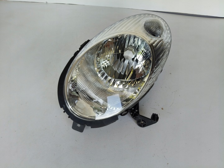 light left REFLEKTOR NISSAN MICRA K12 02