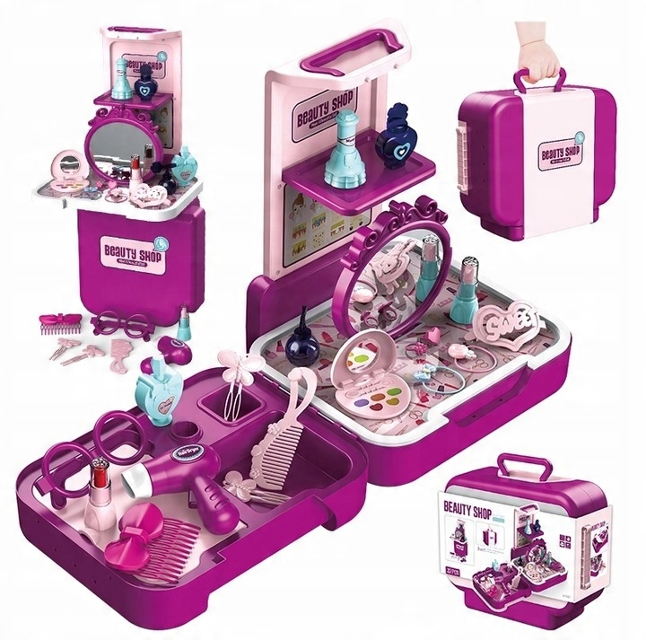 PINK DRESSING TABLE FOR A GIRL, 32-PIECE SUITCASE.