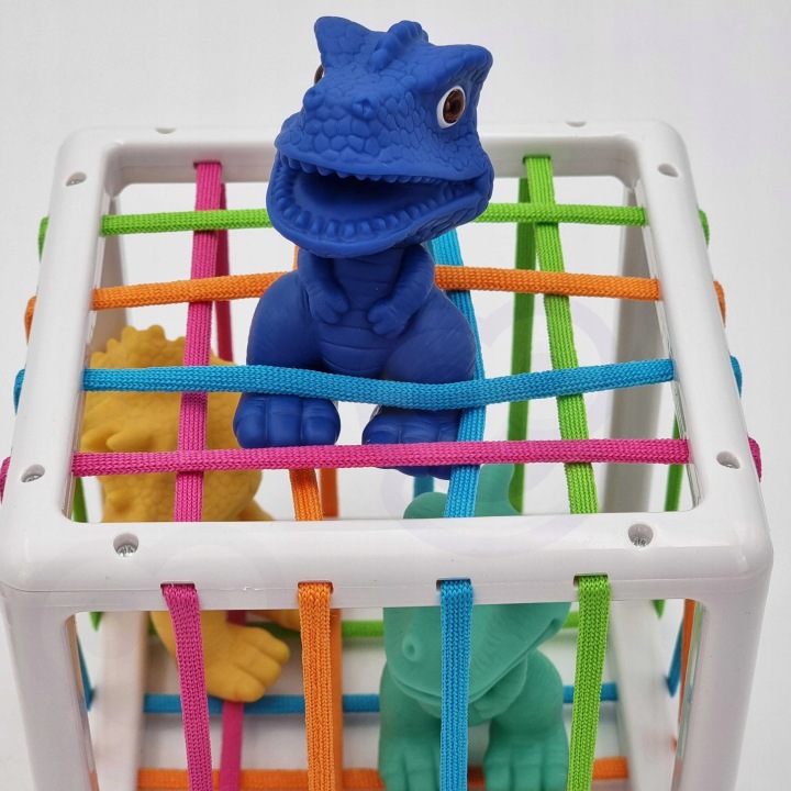 ELASTYCZNA KOSTKA SENSORYCZNA SORTER 5 DINOZAURY Materiał plastik