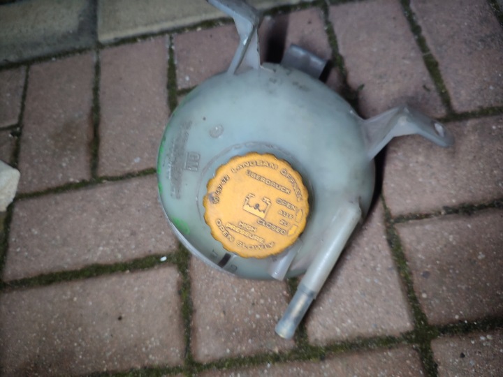 Behälter des Gasses CHLODNICZEGO OPEL CORSA B 90410058