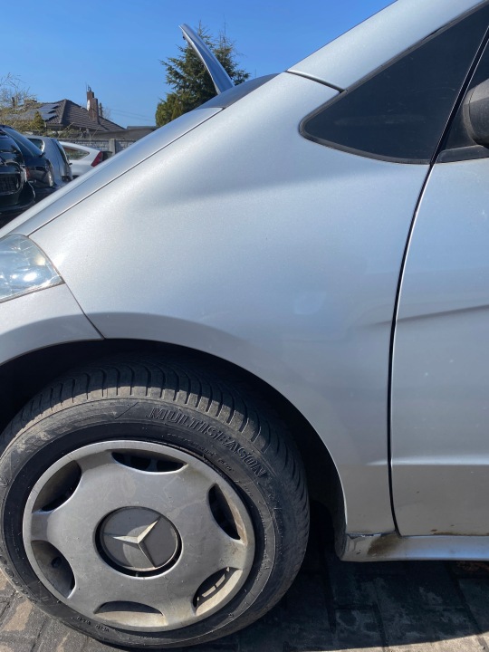 Mercedes A-KLASA W169 04-12 fender left front front kod lakieru 761