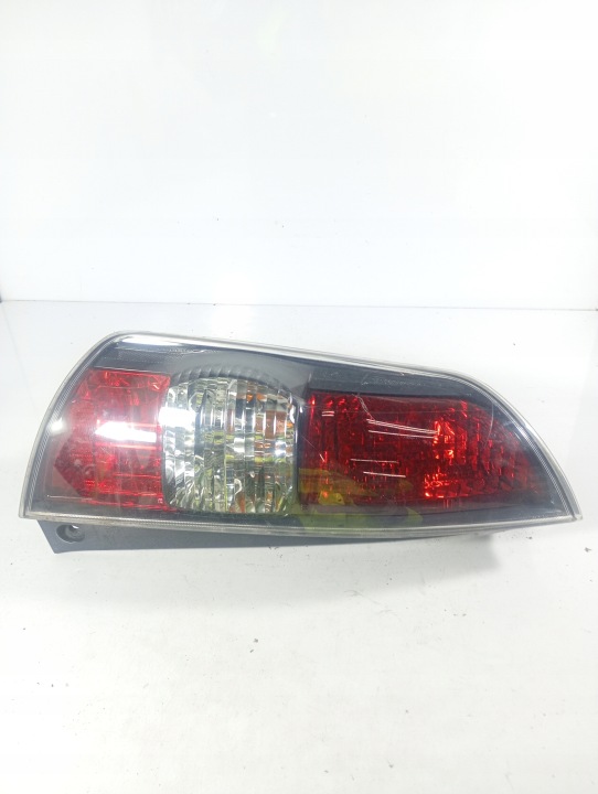 Daihatsu Sirion 2 II 04-10 far lijeva stražnja stražnji dio OE 220-51762