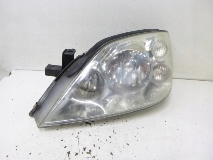 light front Nissan Primera P12 2002r. HELLA 1EJ 238 010-01