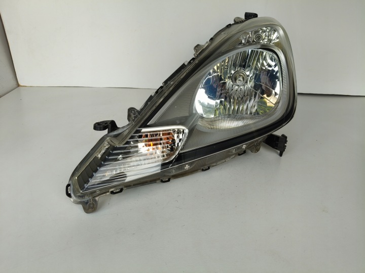 light left REFLEKTOR HONDA JAZZ III 11- LIFT