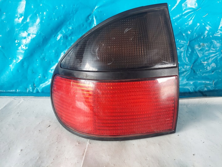 FANALE FARO LAGUNA e HB 7700820052 sinistra posteriore