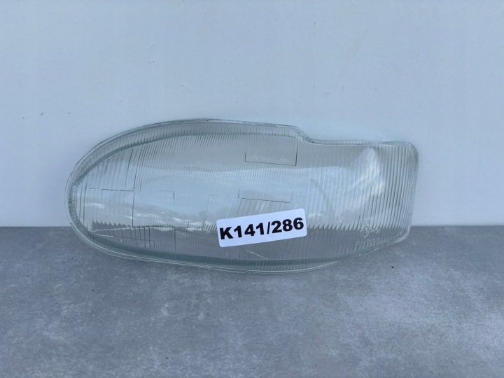 FORD ESCORT MK6 95-00 ROK KLOSZ DO lights LEWEJ front SZKLO 024450 K141/286