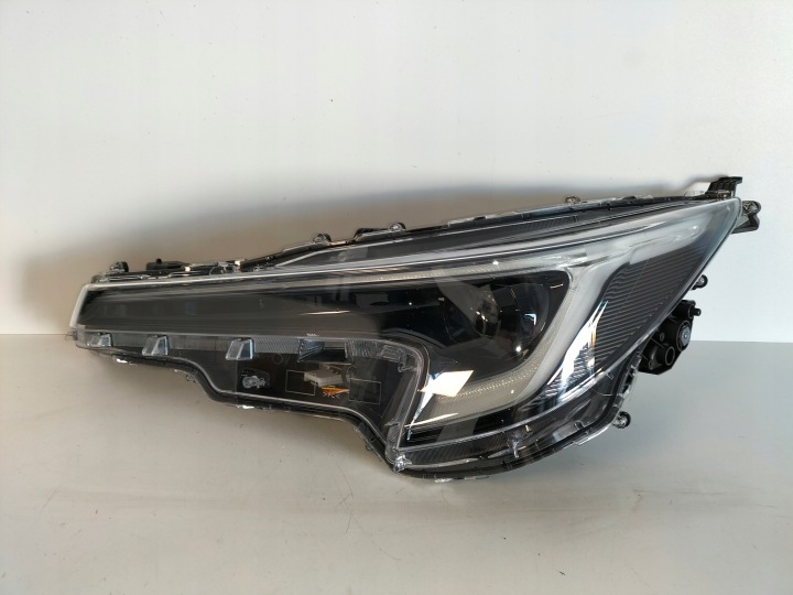 Licht vorne reflektor links TOYOTA COROLLA E21 LIFT 22- HB/KOMBI