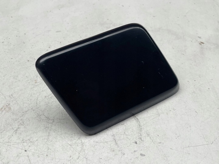spoiler of the washer right Nissan Primera 28658AU300 original!