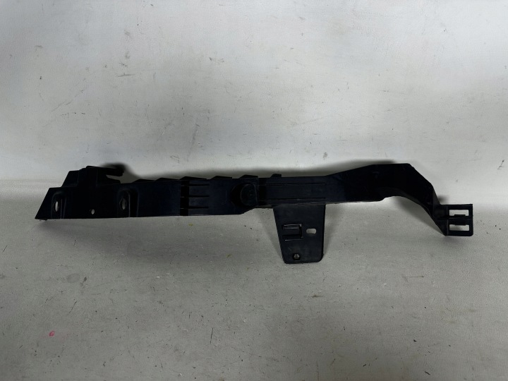 OPEL ASTRA 4 IV J 09- Halter stoßstangenhalterung unter LAMPE links vorne 13287639