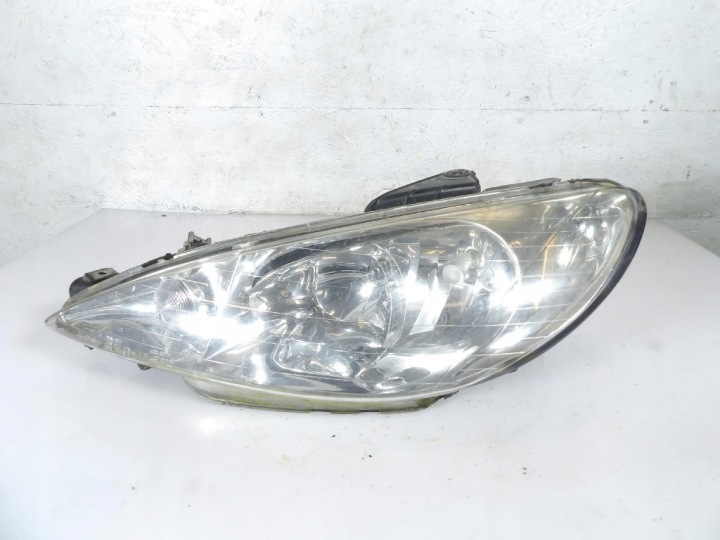 PEUGEOT 206 SW REFLEKTOR left TYC 20-6156