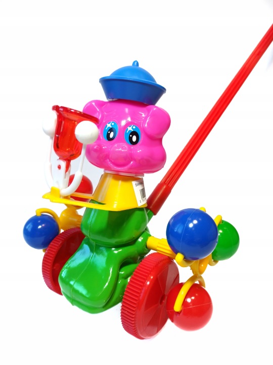 40237 каталка кольорова - свинка з дзвіночком бісквітне печиво