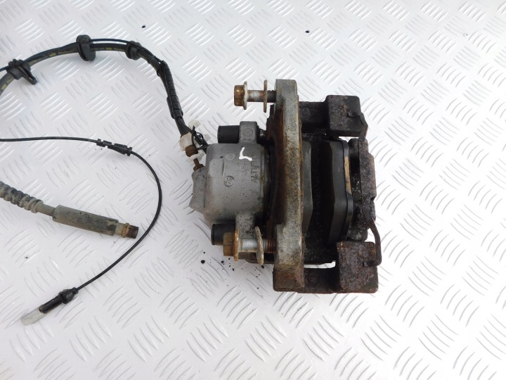 BMW F10 F11 2.0 d caliper jarzmo brakes front left driver´s complete OEM