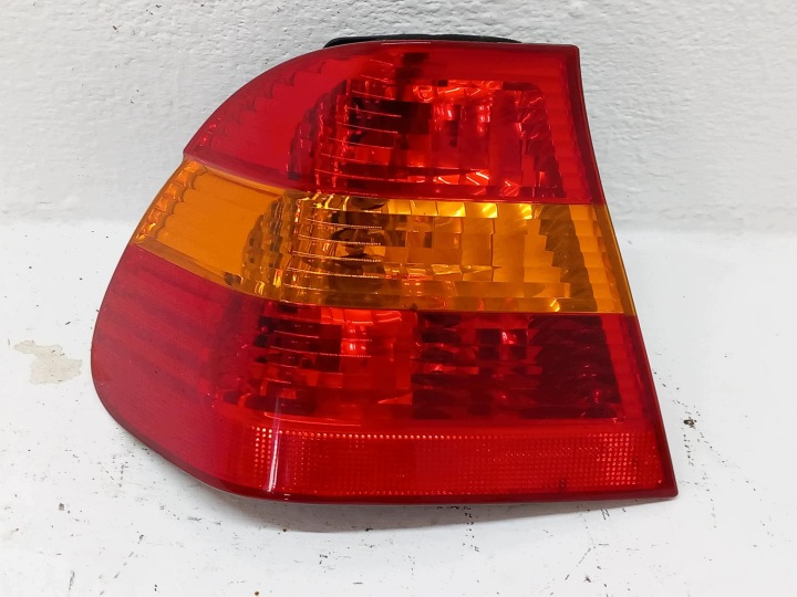 light rear part rear left W fender BMW 3 E46 sedan LIFT OE 6907933