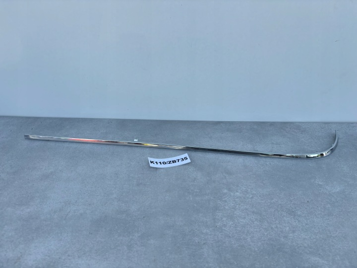 MERCEDES E-KLASA W210 KOMBI left moulding of a bumper rear part CHROM LH K110/ZB735