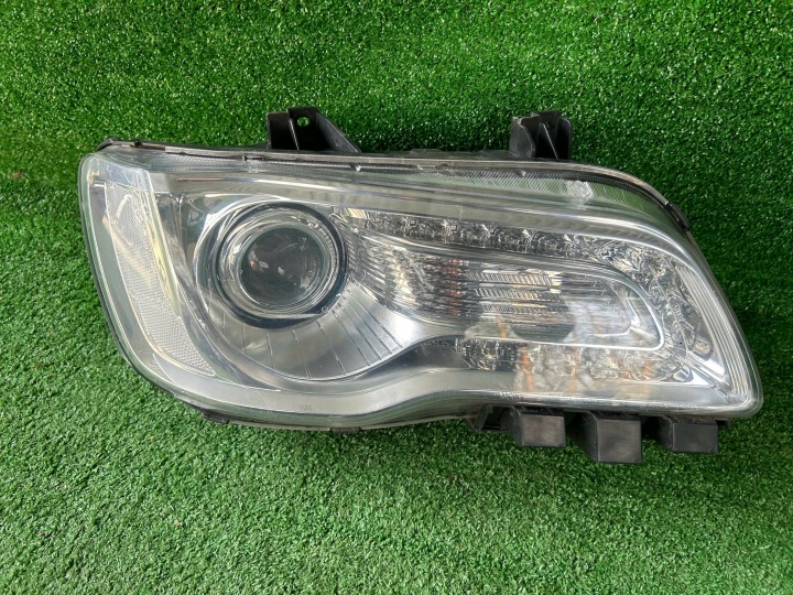 LANCIA THEMA LED XENON RECHTS VORNE VORNE 1EJ263042-00