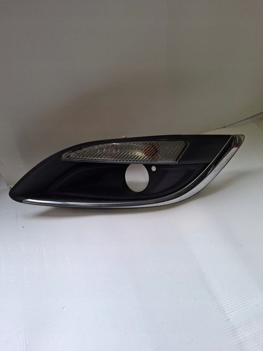 grid of a bumper left indicator OPEL ASTRA IV 13368708