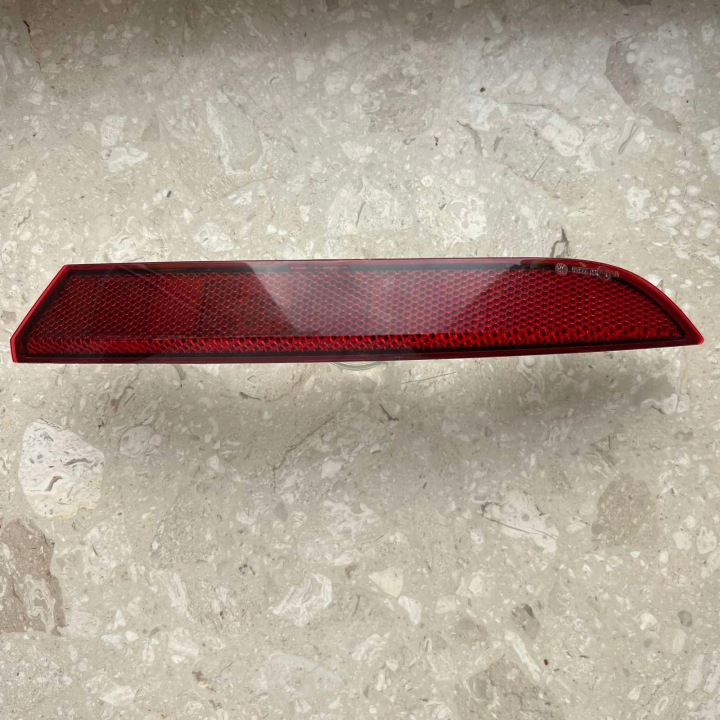 SKODA OCTAVIA IV KOMBI LIFT 24 - ODBLASK of a bumper left rear part 5E7945105