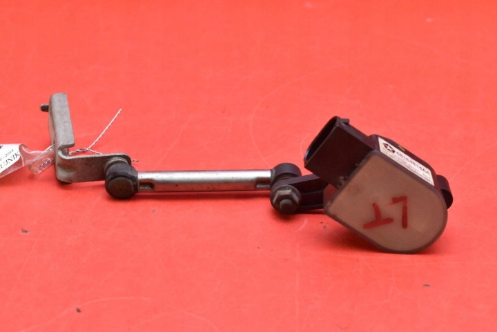 sensor POZIOMOWANIA of the lights left rear part 68164814AA JEEP GRAND CHEROKEE IV WK2