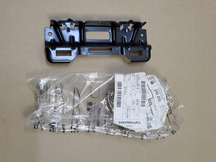 console holder of the bracket handles of the roof VW TOURAN III 5TA858687B OE