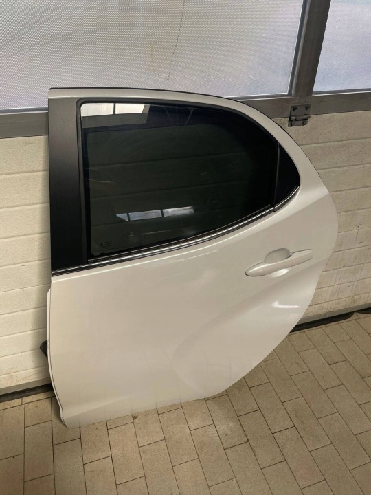 Tür hinten heck Seite links Mazda 2 2024r Leiste Schutzleiste chrom 089