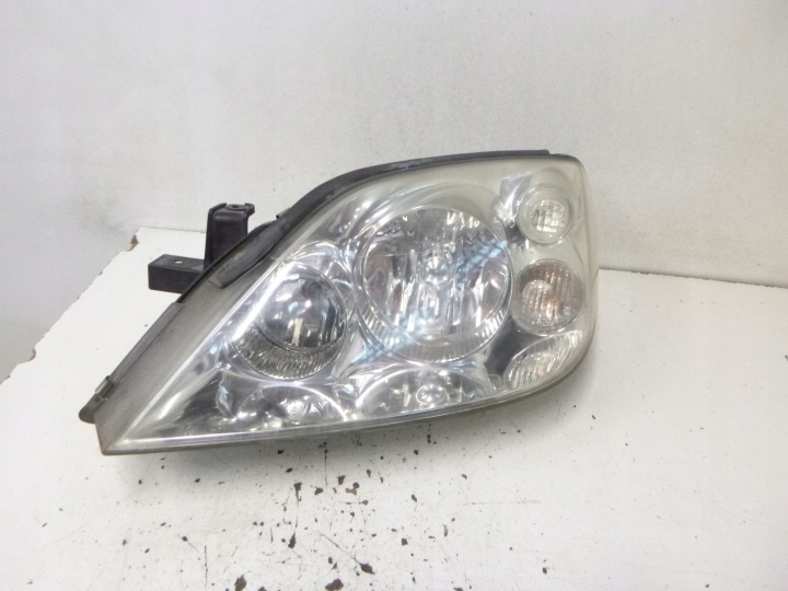 light front Nissan Primera P12 2007r. HELLA