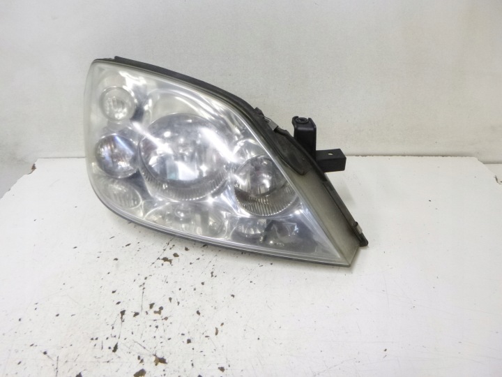 light front Nissan Primera P12 2007r. 1EJ238010-02 HELLA