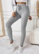 Zdjęcie oferty: Damskie sportowe legginsy do jogi i fitness - szary prążek L