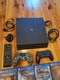 Zdjęcie oferty: Konsola PlayStation 4 Pro 1 TB czarny + 2 pady + ładowarka + gry