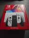 Zdjęcie oferty: Nintendo switch OLED + dwie gry + etui + karta pamięci