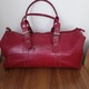 Zdjęcie oferty: Solidna duża pojemna wytrzymała bordowa torba podróżna 