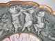 Zdjęcie oferty: Porcelanowy talerz reliefowy putta Schierholz Handmalerei