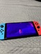 Zdjęcie oferty: Nintendo Switch OLED + SD 128GB + etui, komplet, stan bardzo dobry