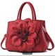 Zdjęcie oferty: Piękna czerwona torebka z kwiatem, do ręki i na ramię. NOWA