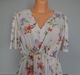 Zdjęcie oferty: Bodyflirt Biała rozkloszowana sukienka w kwiaty rozm.32/34