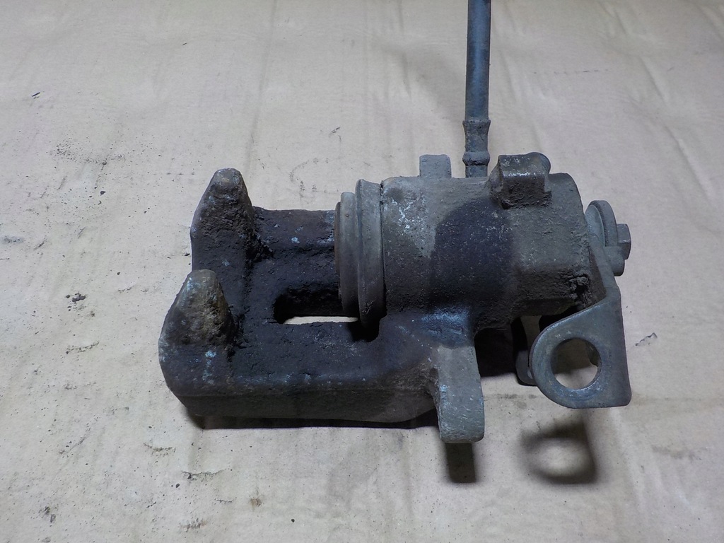 фото №7, Fabia ii roomster 1.9tdi суппорт правый задняя